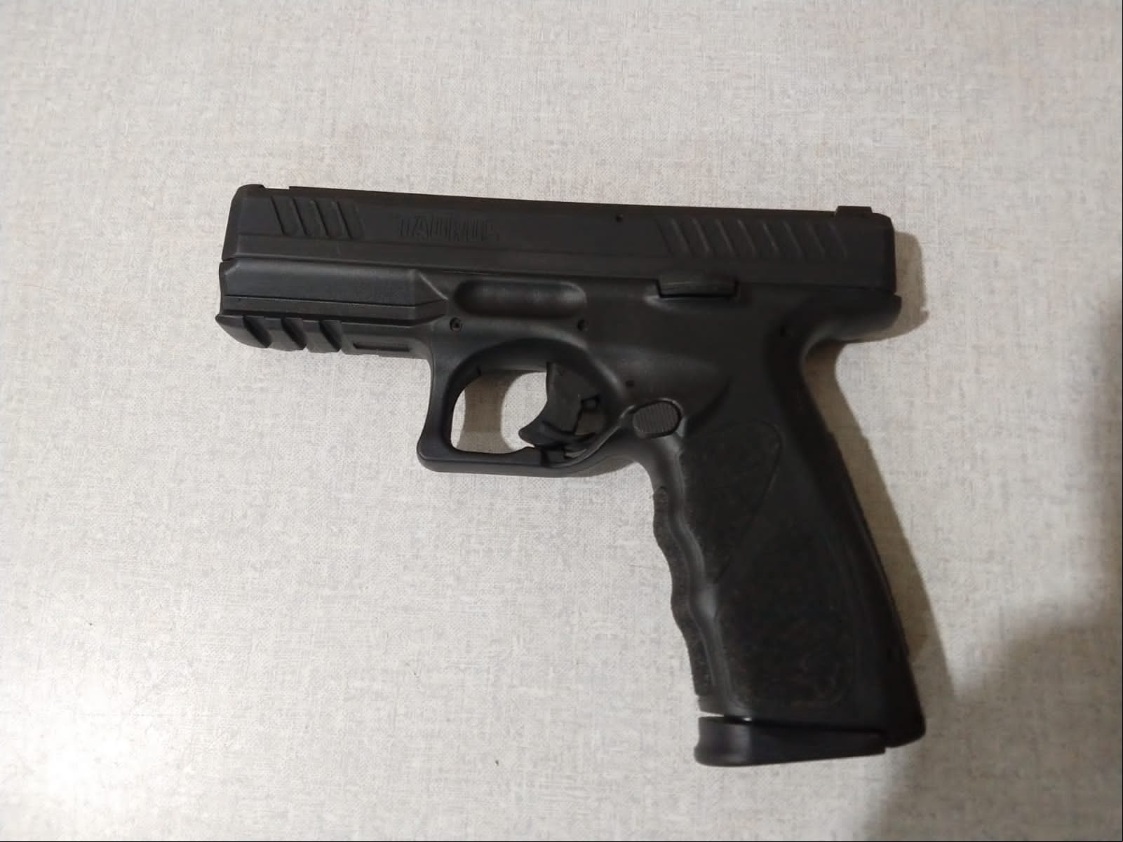 Pistola Apreendida  